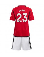 Manchester United Luke Shaw #23 Kotipaita Lasten 2023-24 Lyhythihainen (+ shortsit)